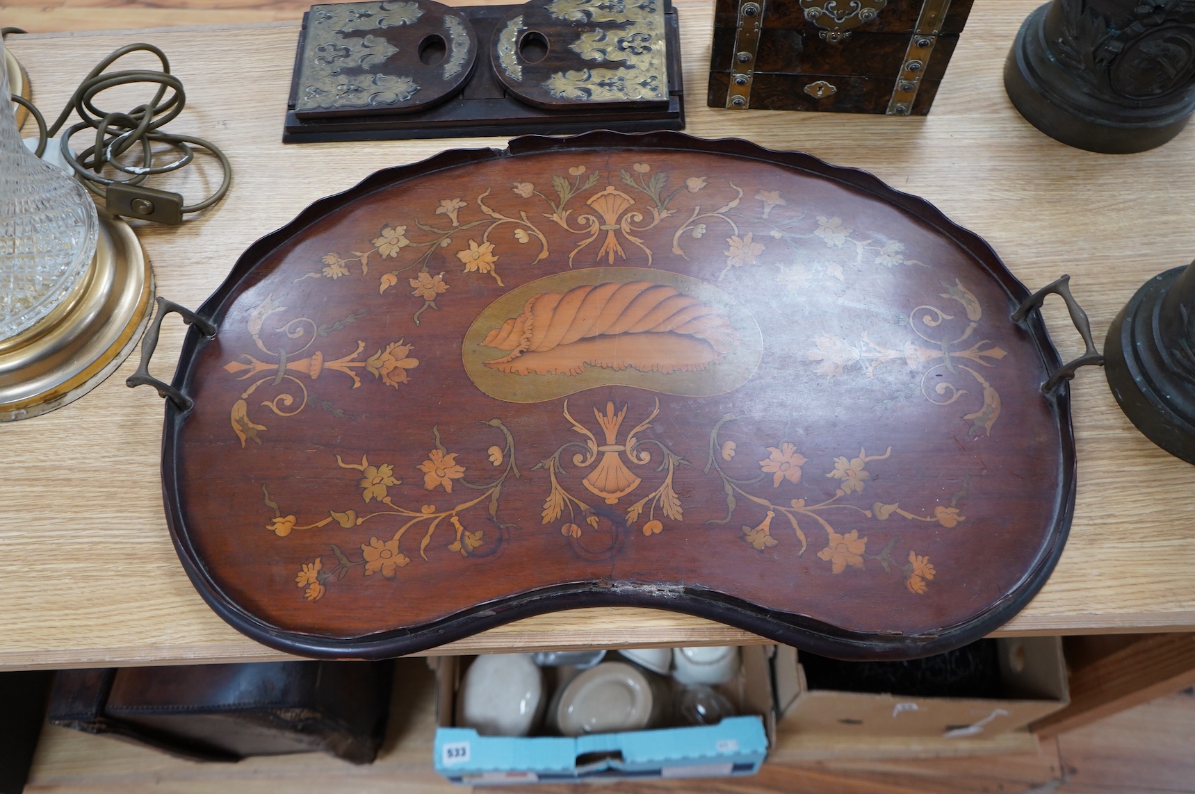 A Victorian domed scent bottle casket, two brass mounted book slides and a marquetry tray, 68cm